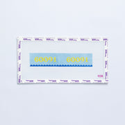 Needlepoint pattern key fob with 60091 zip code in yellow on a blue background with blue scallop edge. 