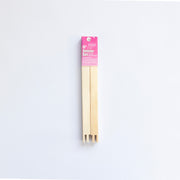 Pack of stretcher bars with pink label on a white background
