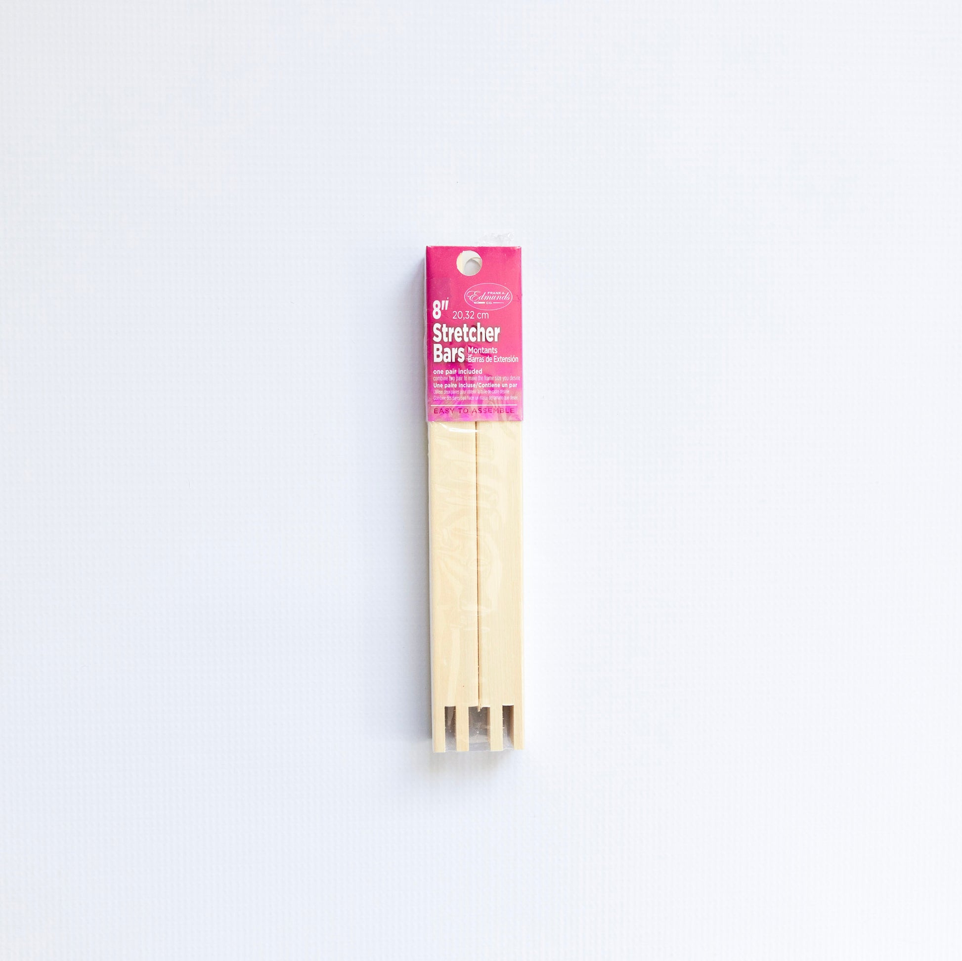 Pack of Stretcher Bars with pink packaging on a white background