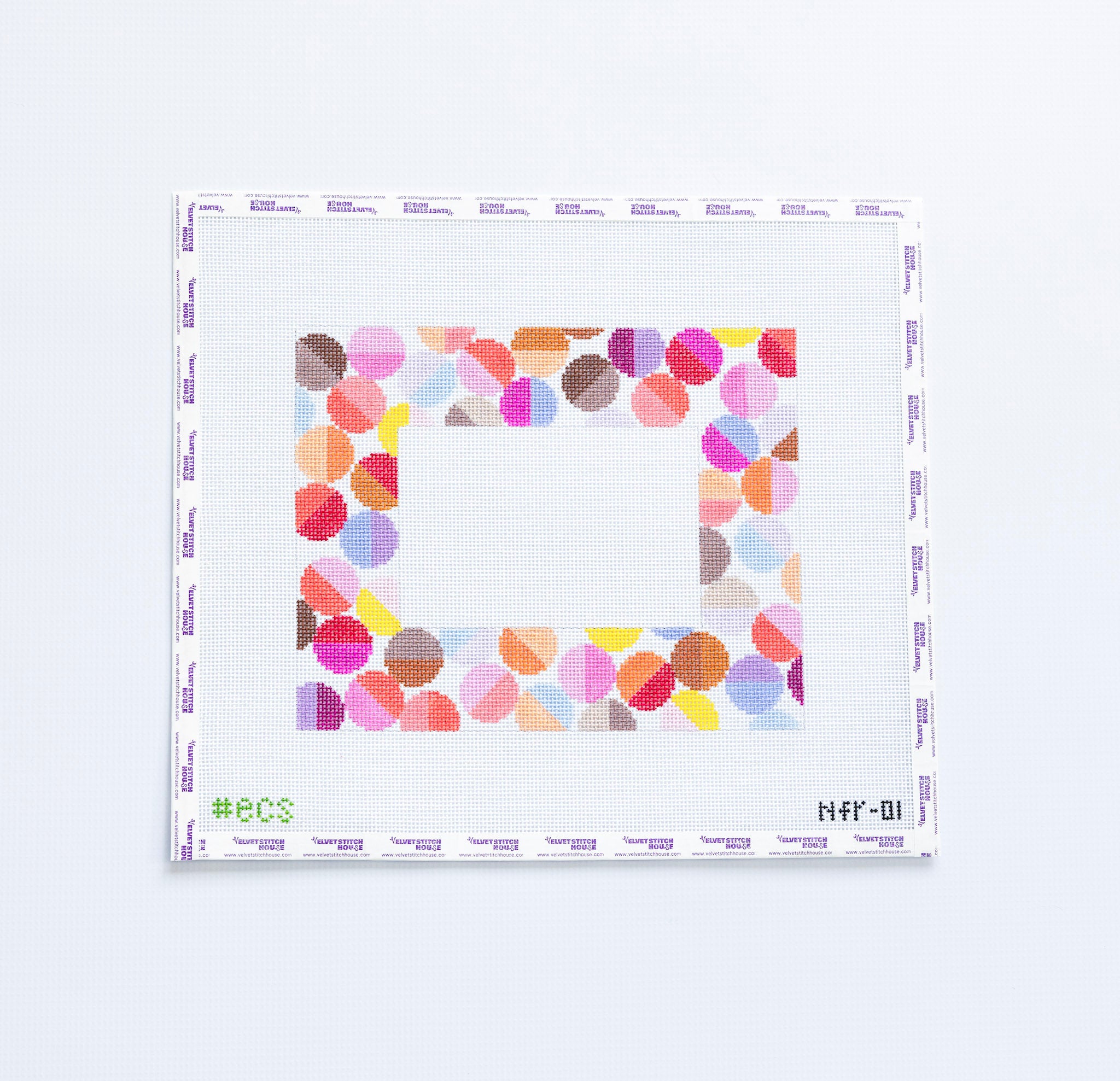 Colorful geometric needlepoint frame pattern with multicolored circles
