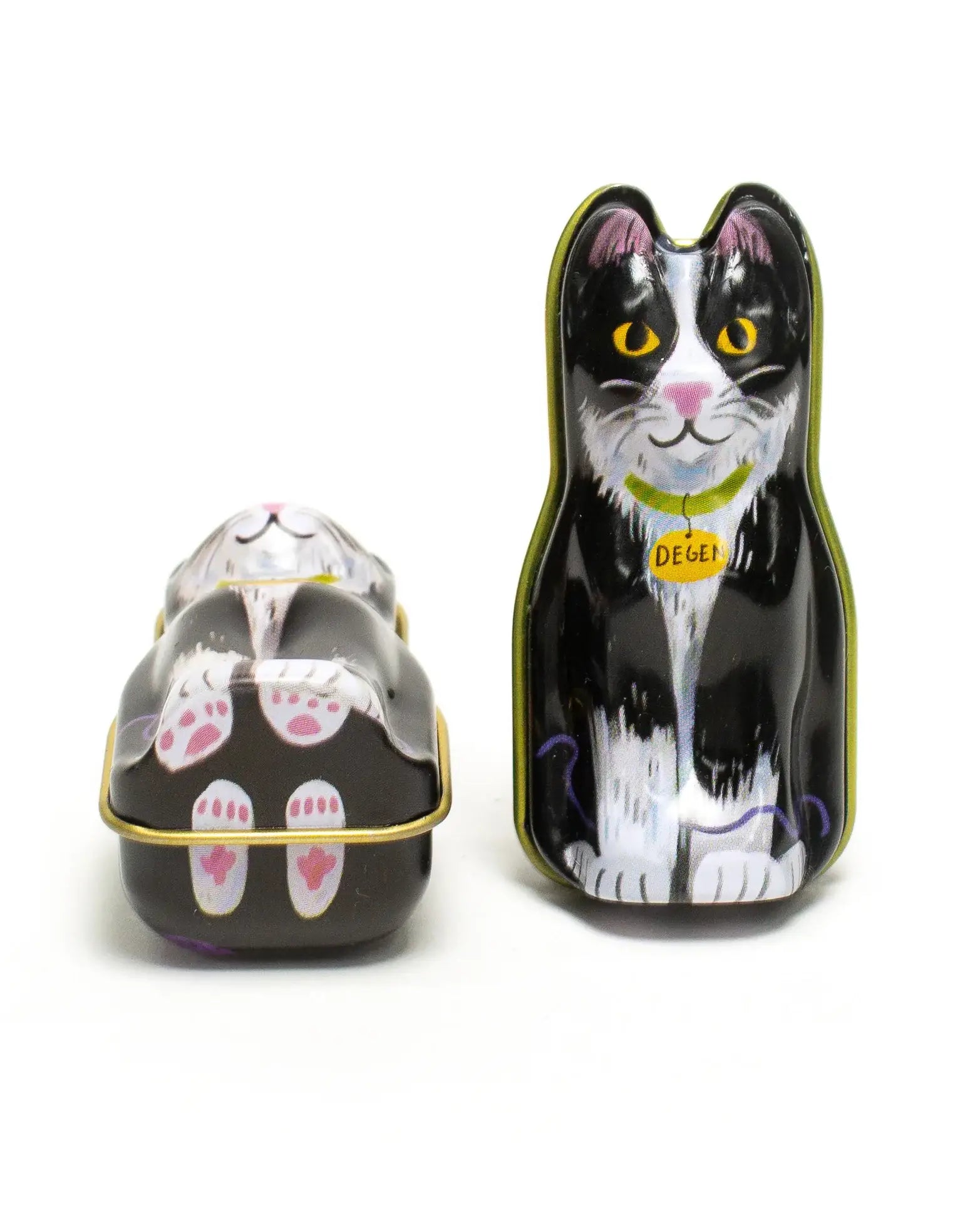 Cat-shaped containers with one open showing paw prints on a white background