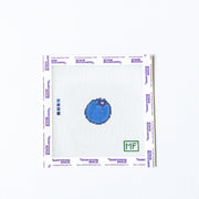Needlepoint pattern with a blueberry on a white background