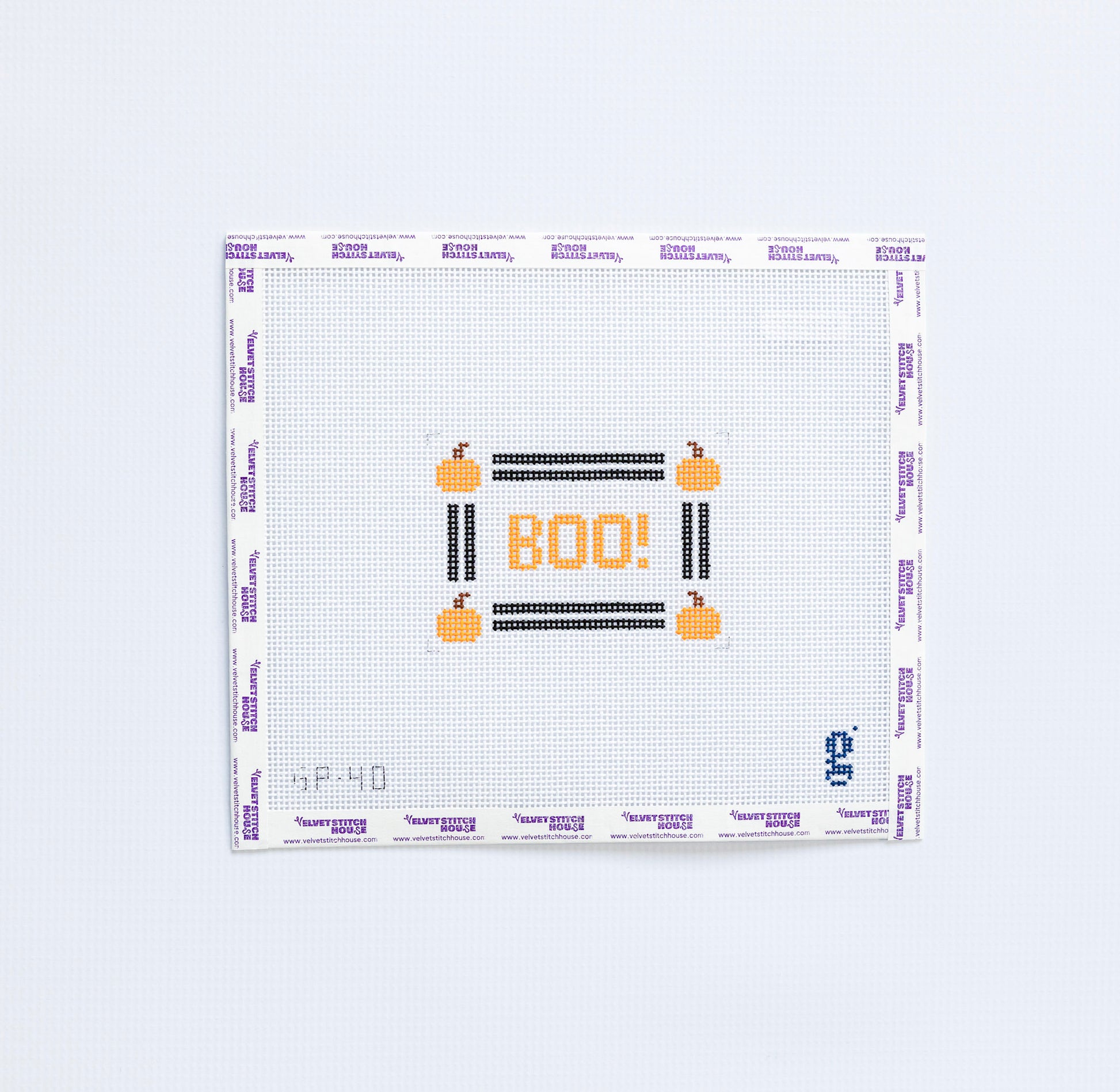 Needlepoint pattern with 'BOO!' text and pumpkins on a white background
