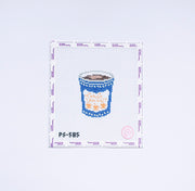 Needlepoint design of a classic coffee cup with blue and white detail.