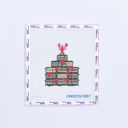 Needlepoint design of crates with a lobster on top, labeled 'Frances Mary'.