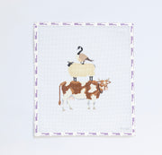 Needlepoint design of a cow, sheep, and goose on a white background.