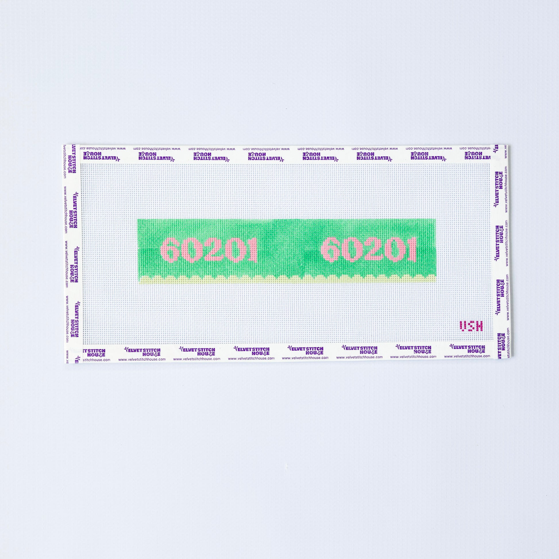 Needlepoint key fob pattern with '60201' zip code in pink on a green background with yellow scallop edge.
