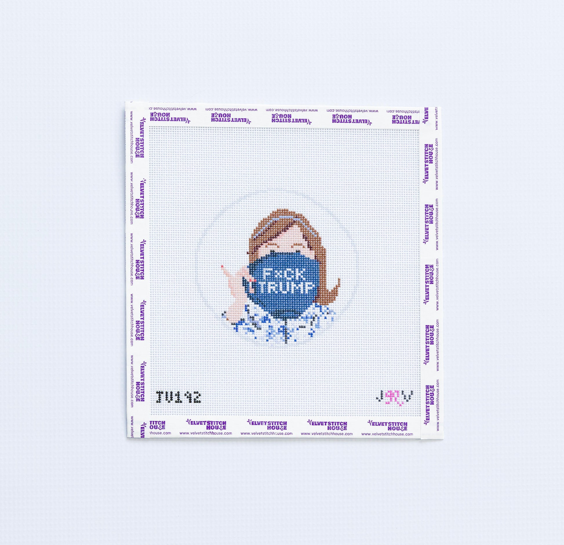 Needlepoint round design with a portrait and 'F*ck Trump' text on a blue coffee mug white background