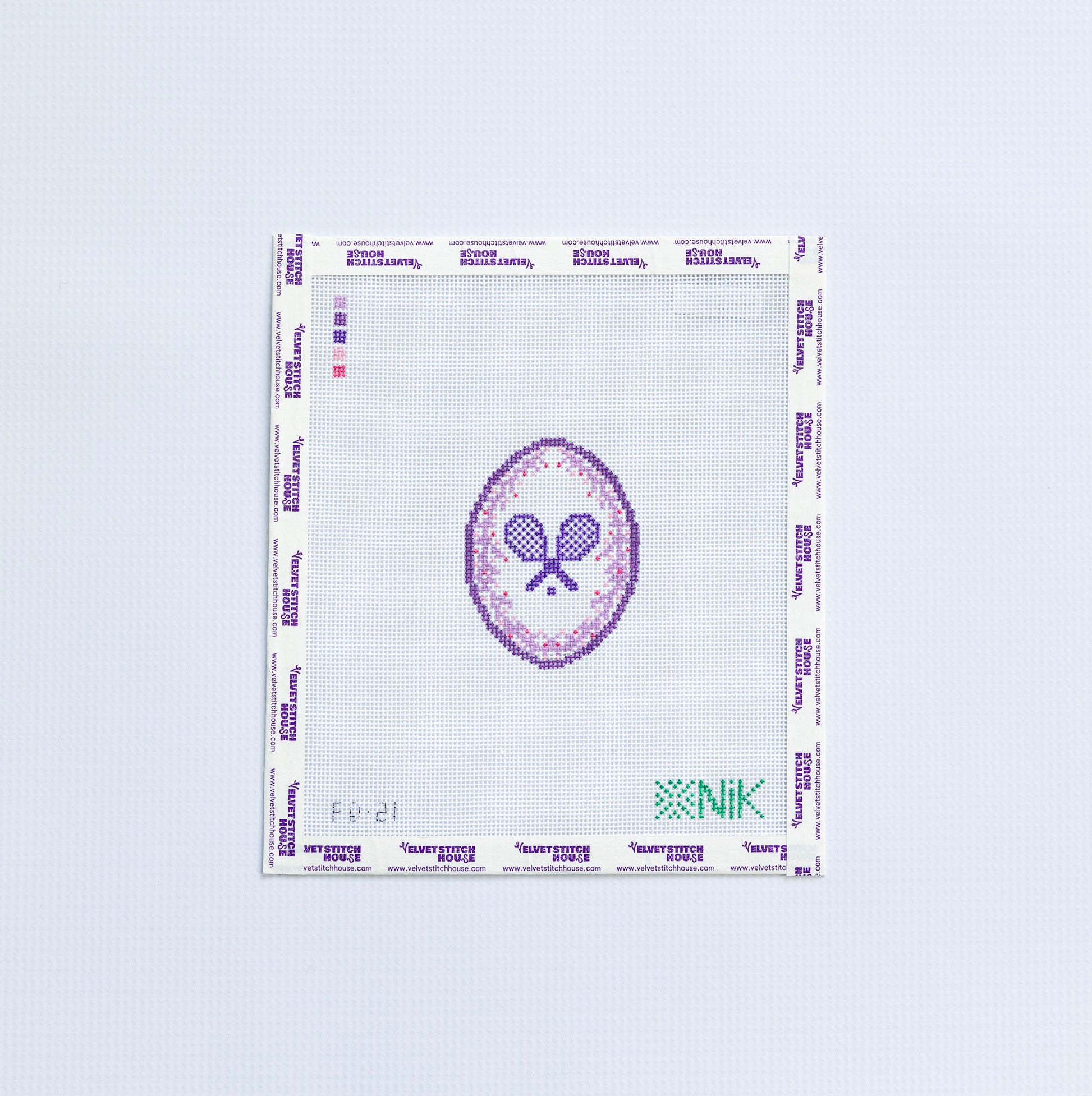 Needlepoint design of a tennis-themed logo and text in purple on a white background
