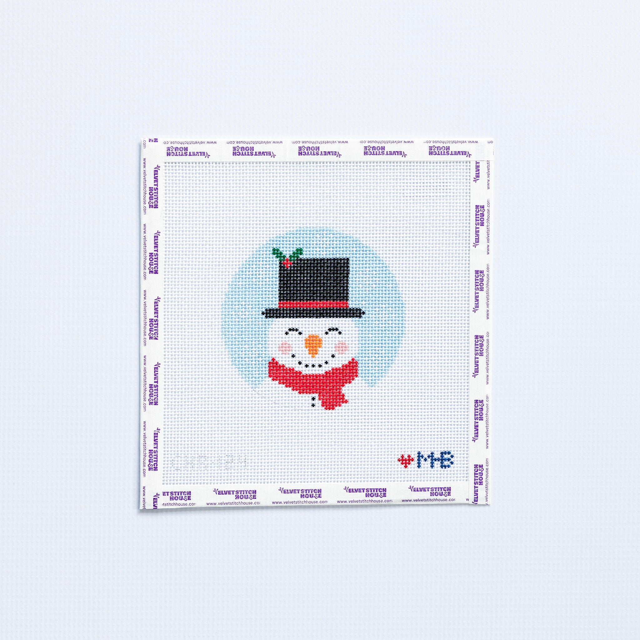 Needlepoint pattern round with Frosty the snowman with black top hat on a light blue background