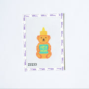 Needlepoint design with Colorful teddy bear with a 'Hey Hon' sign on a white background