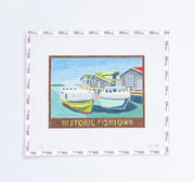 Needlepoint pattern of a coastal scene and with boats 'Historic Fishtown' text