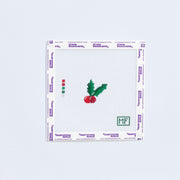 Needlepoint design of a red holiday berry with leaves.