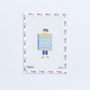 Needlepoint design of a person holding a book titled 'I Read Banned Books' on a white background