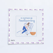Needlepoint pattern with a girl holding a needle and thread, text 'I'd Rather Be Needlepointing'