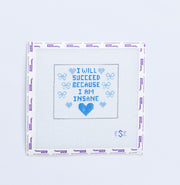 Neelepoint pattern with "i will succeed becuase i am insane" in blue text with blue hearts and bows
