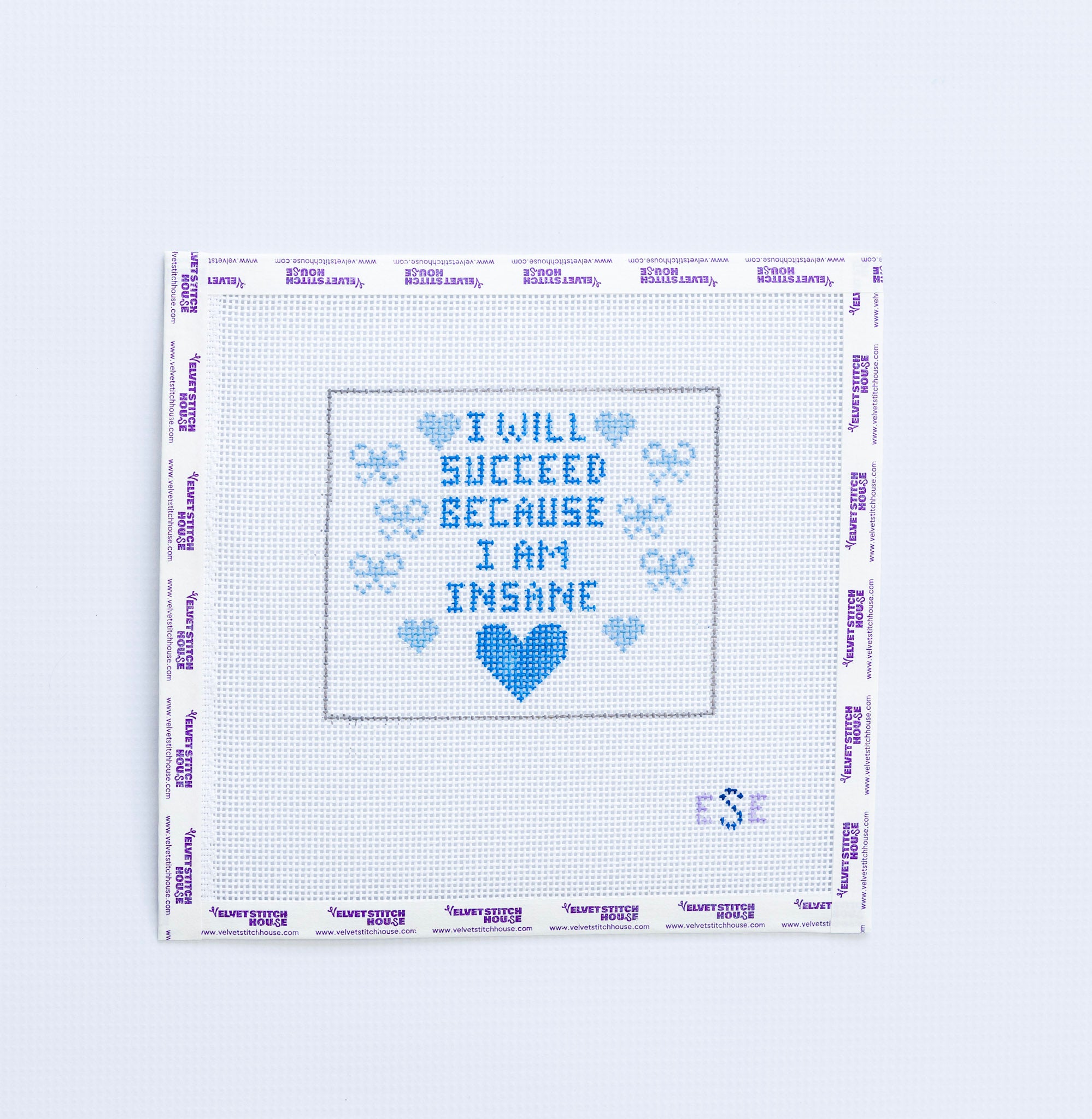 Neelepoint pattern with "i will succeed becuase i am insane" in blue text with blue hearts and bows