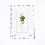 Needlepoint pattern of a woman holding a monkey on a white background