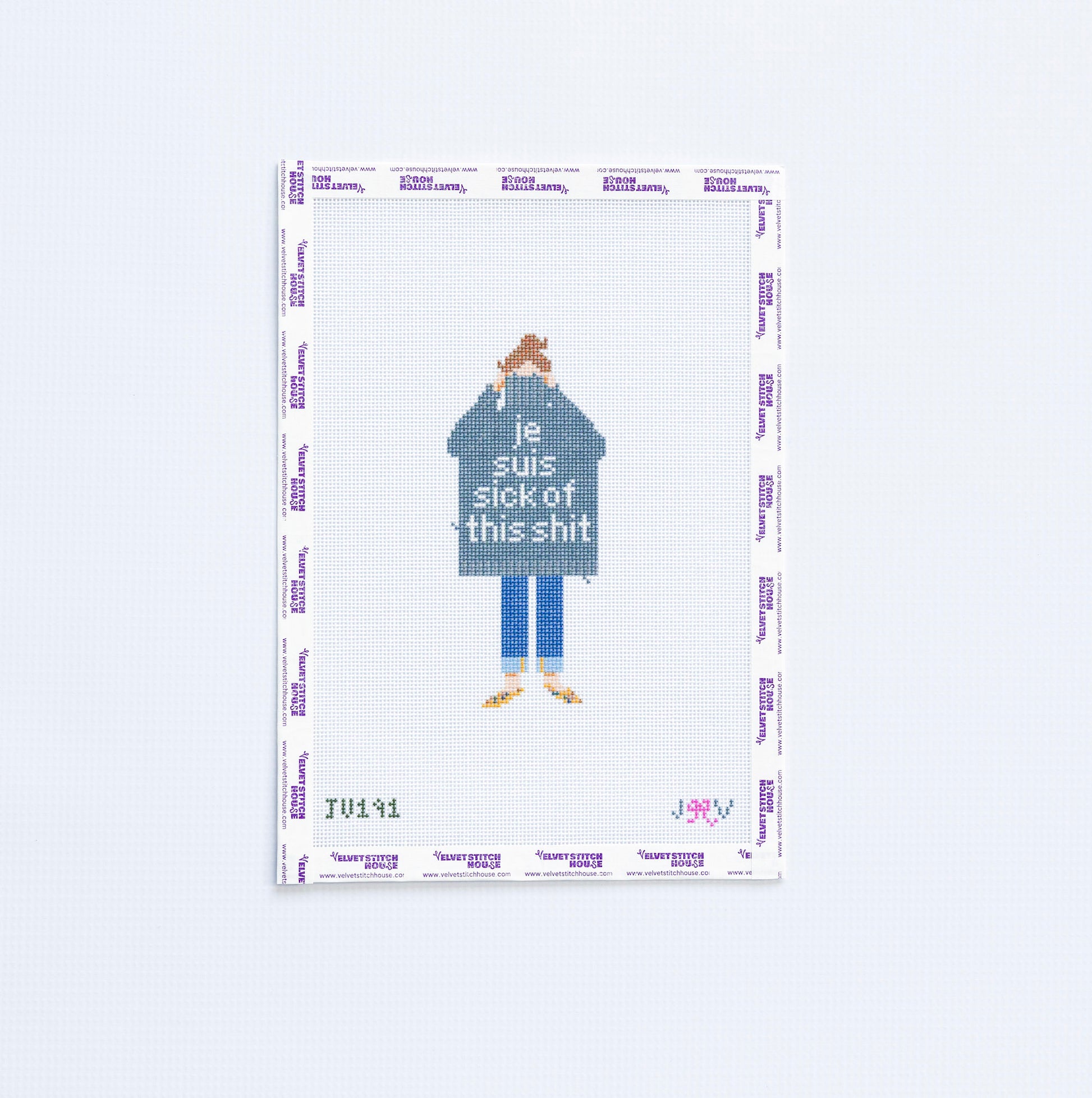 Needlepoint design of a person wearing a black shirt with text "je suis sick of this shit" on a white background