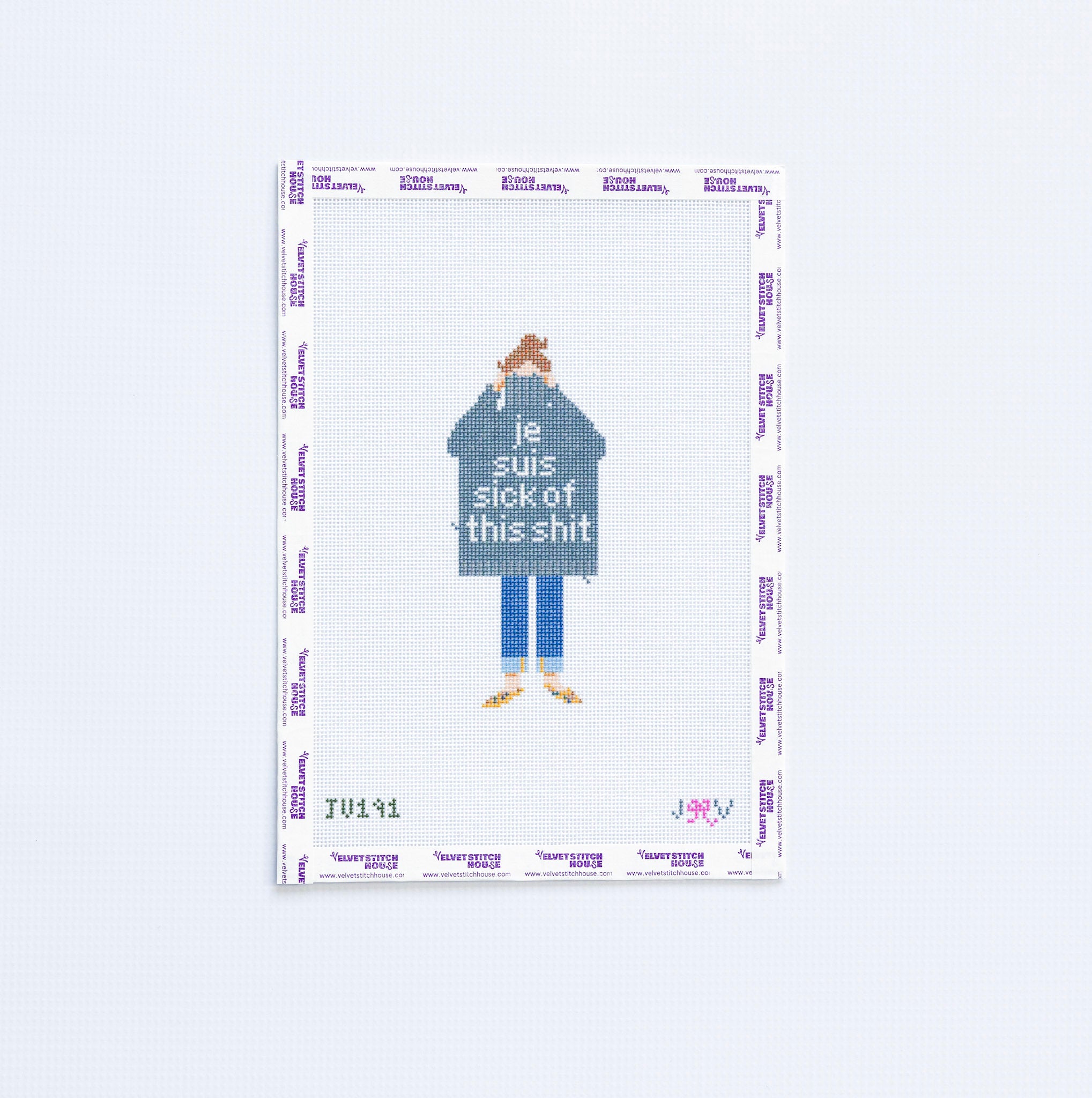Needlepoint design of a person wearing a black shirt with text "je suis sick of this shit" on a white background