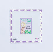 Needlepoint design with a young girl with blonde hair and text "are you there god" on a light purple background