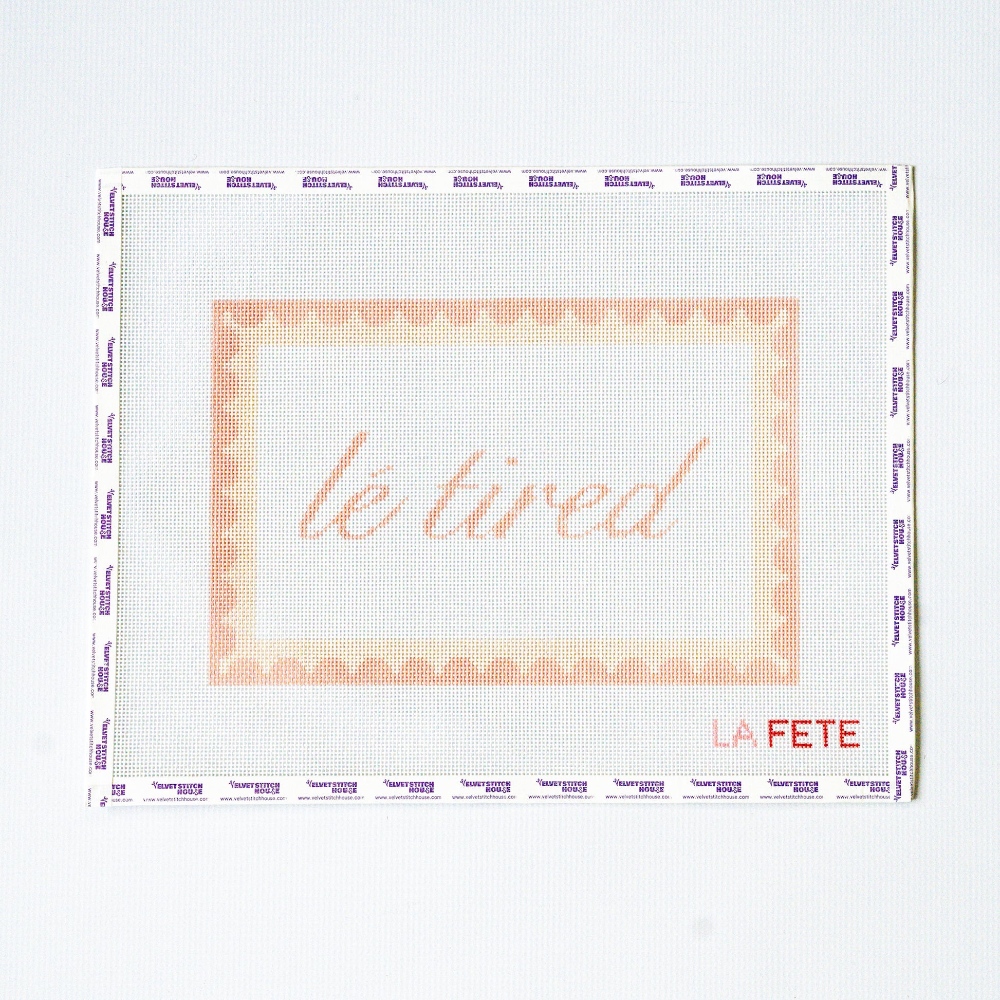 Needlepoint pattern with light pink 'le tired' text on a white background with scallop border
