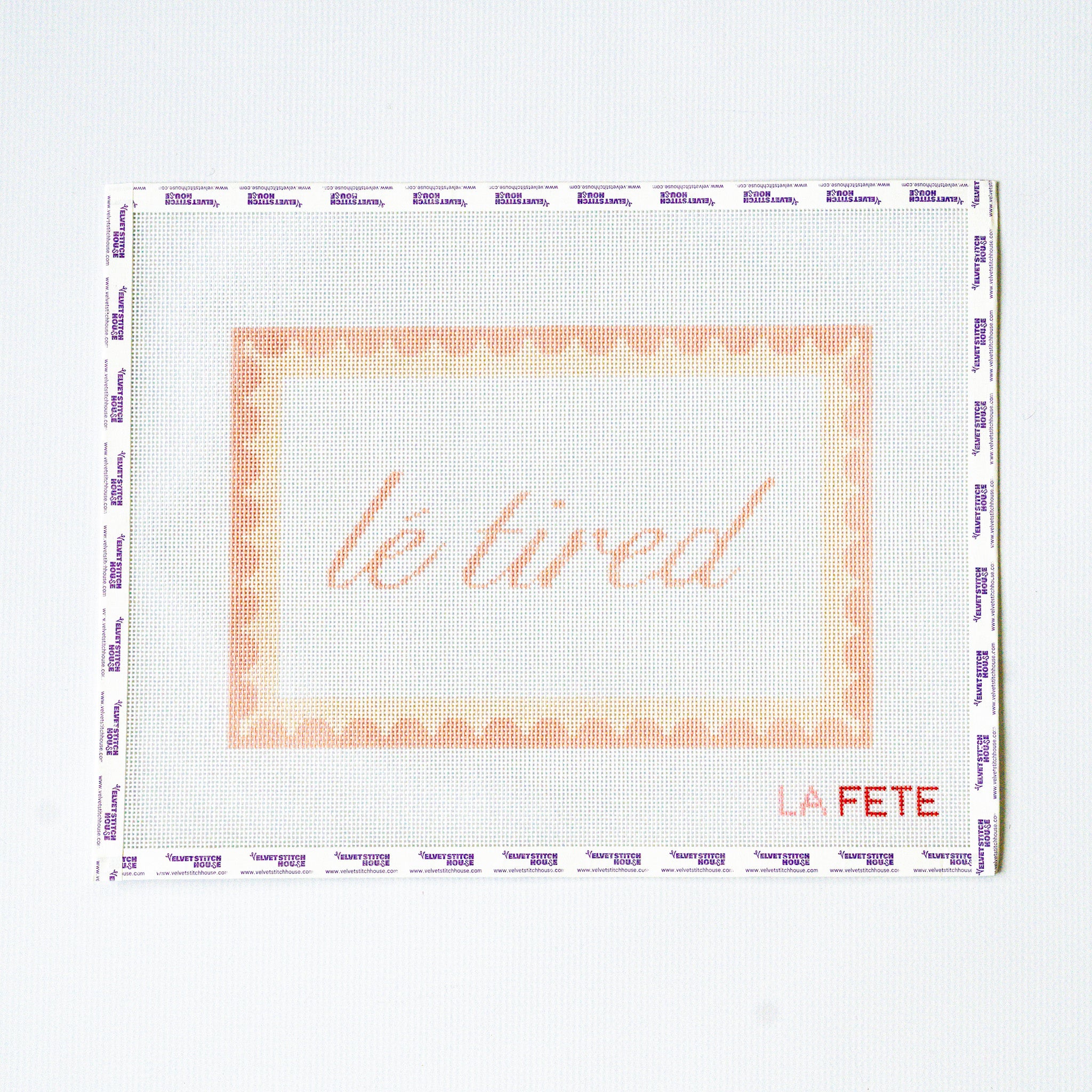 Needlepoint pattern with light pink 'le tired' text on a white background with scallop border