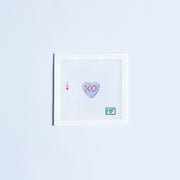 Mini needlepoint pattern with a purple heart and 'XO' text in red.