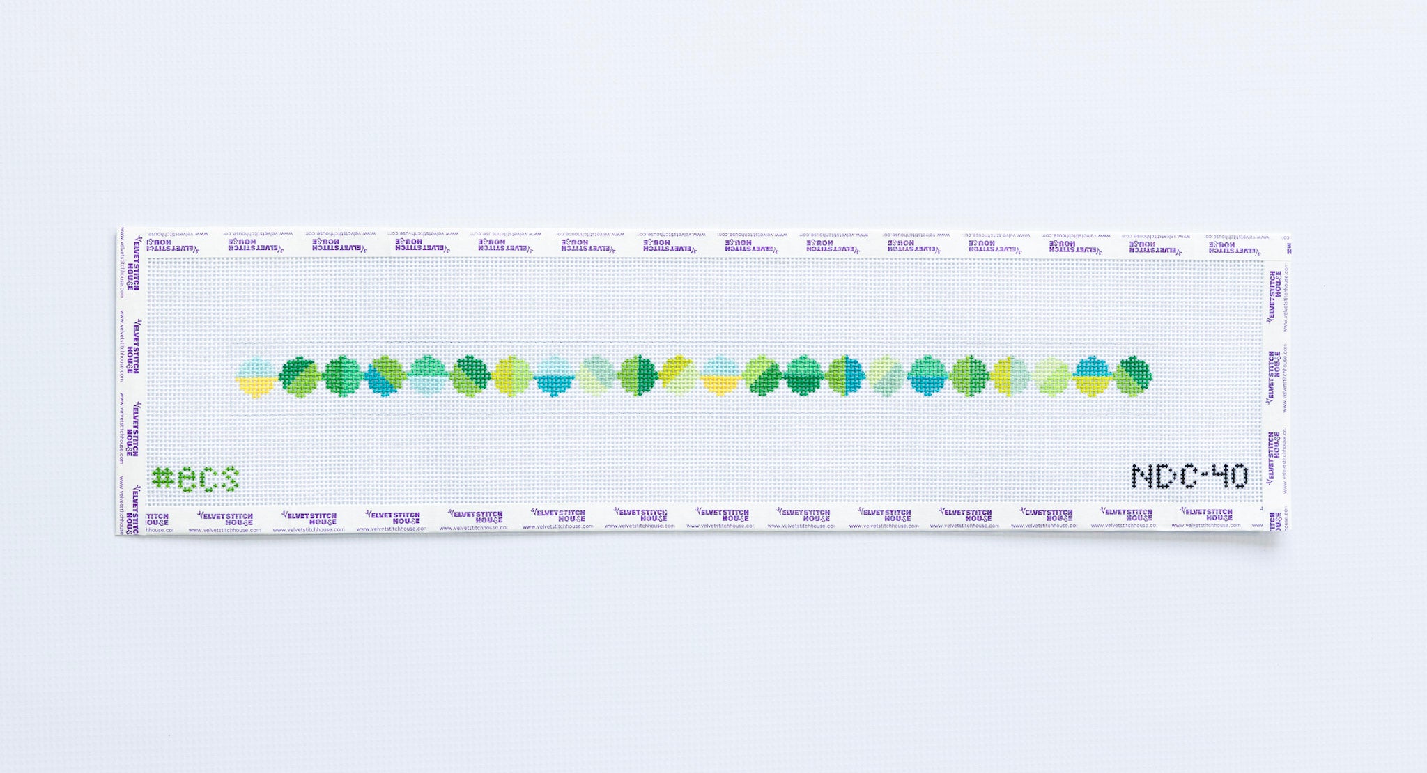 Needlepoint dog collar pattern with green and blue geometric circle pattern