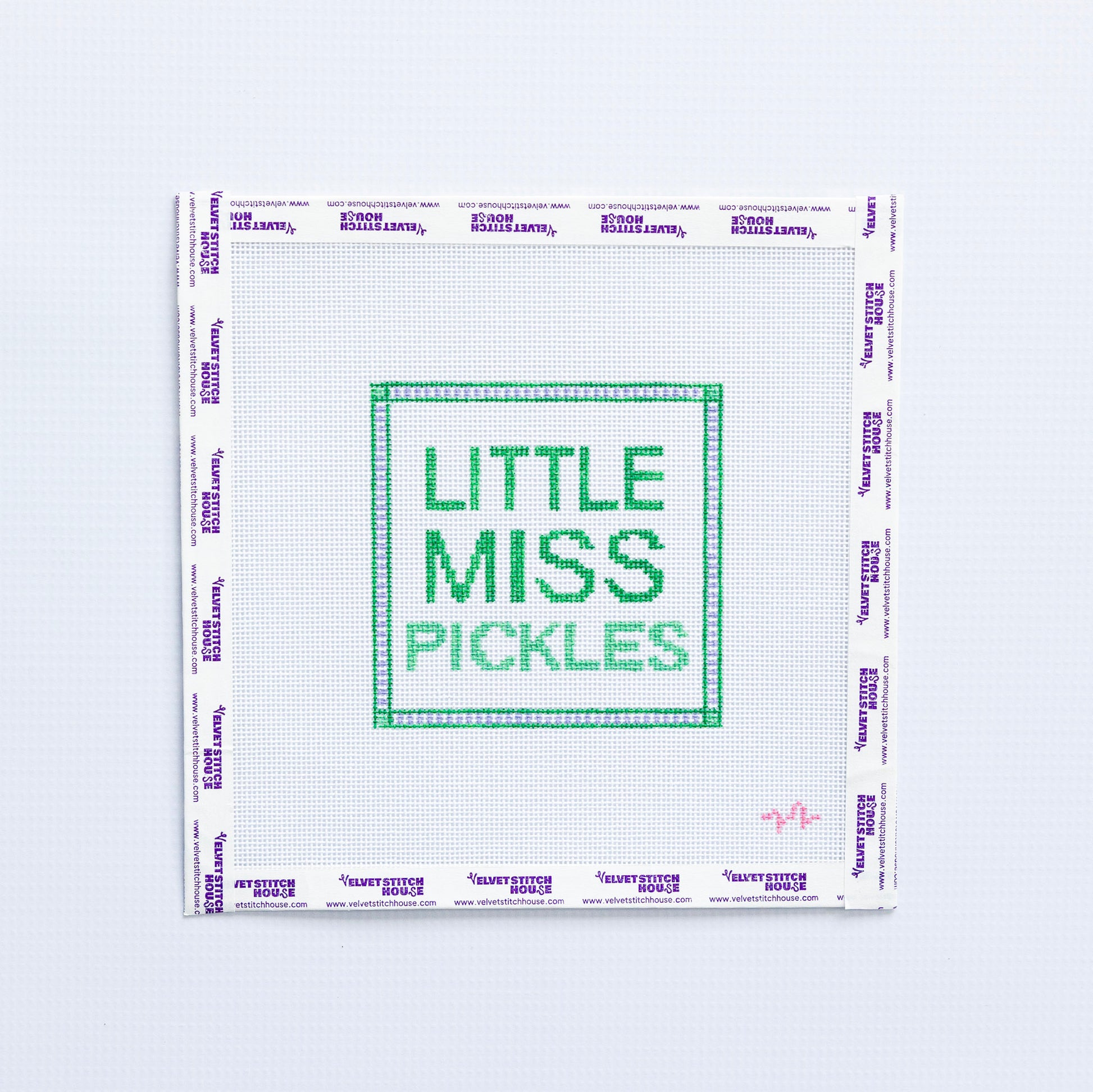 Needlepoint pattern with 'Little Miss Pickles' green text on a white background