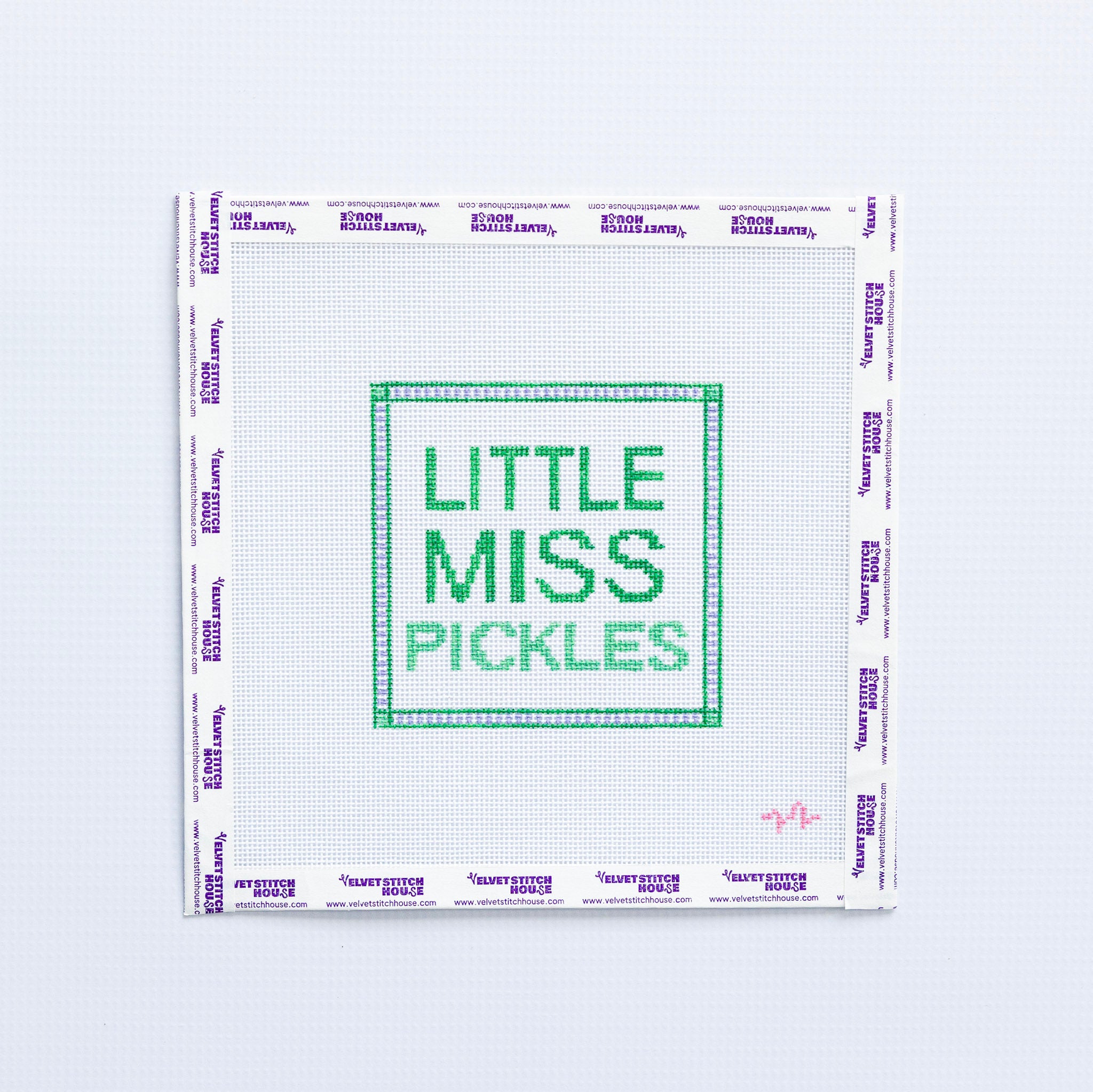 Needlepoint pattern with 'Little Miss Pickles' green text on a white background