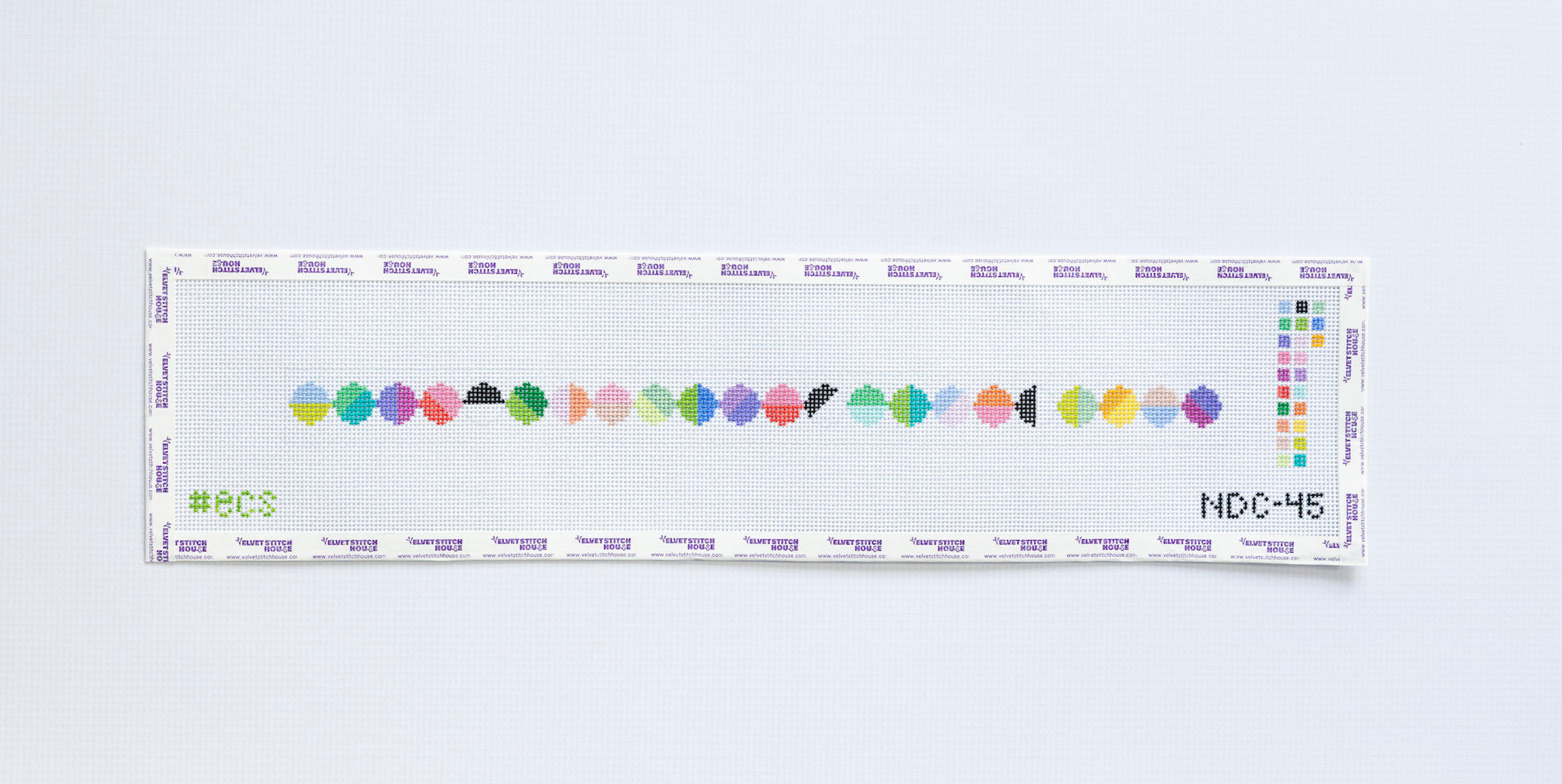 Needlepoint dog collar pattern with various colors in geometric circles
