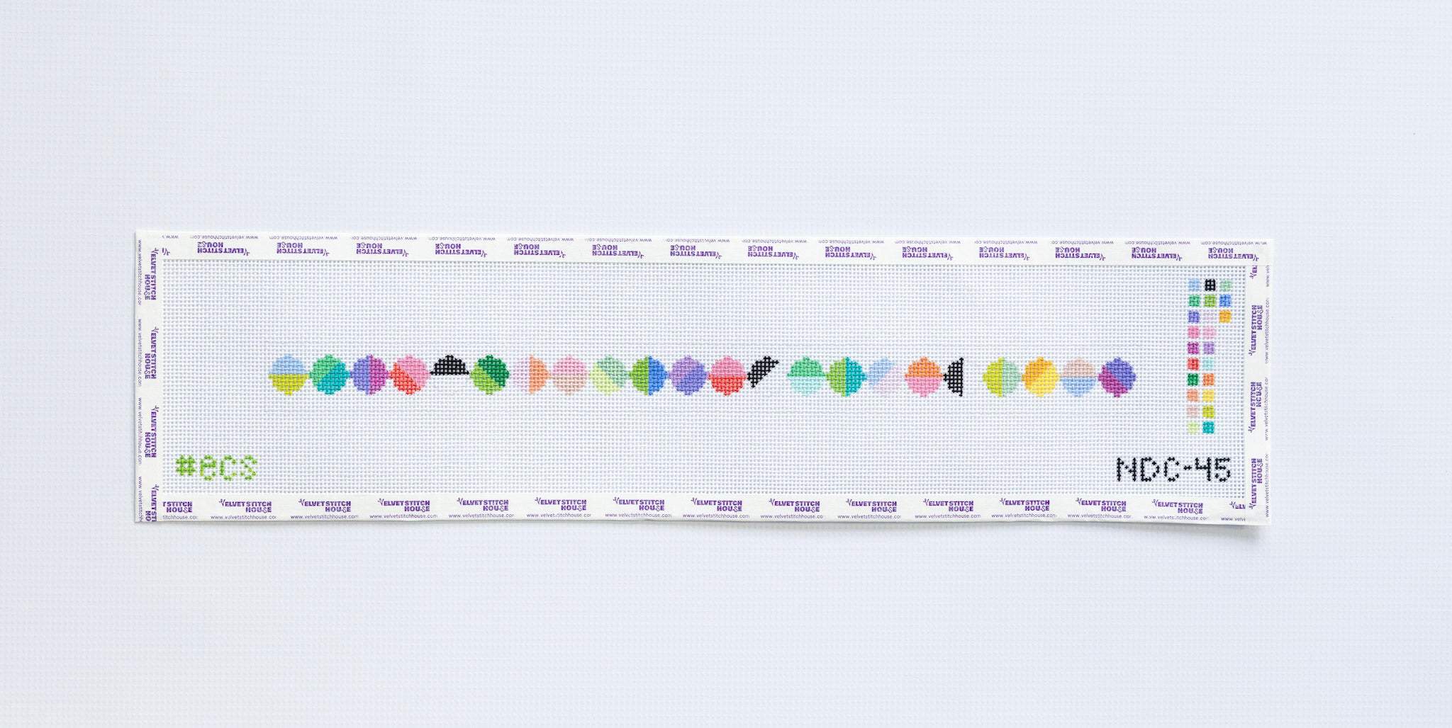 Needlepoint dog collar pattern with various colors in geometric circles