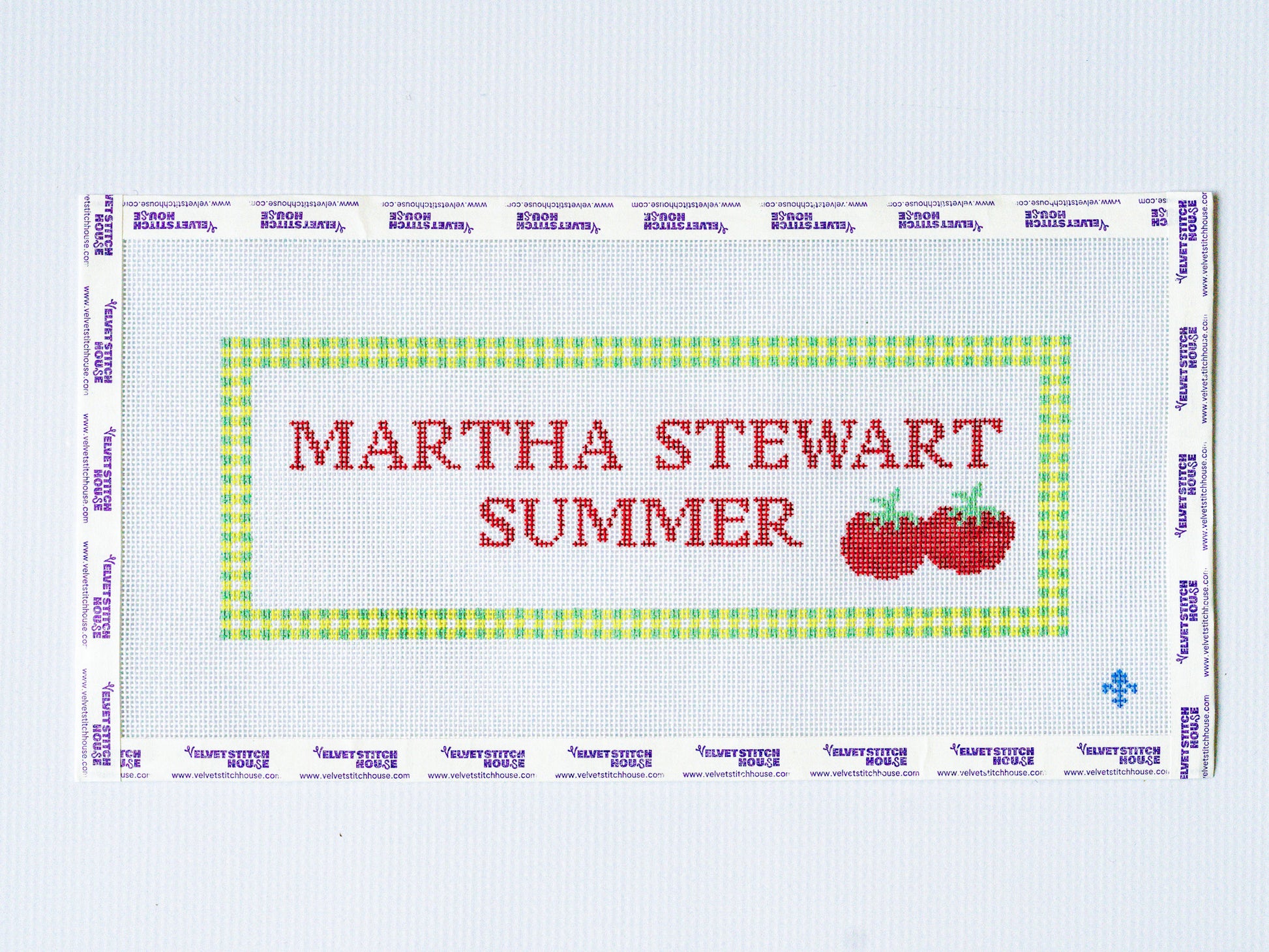 Martha Stewart Summer needlepoint design with red text and green border on a white background and tomato icon