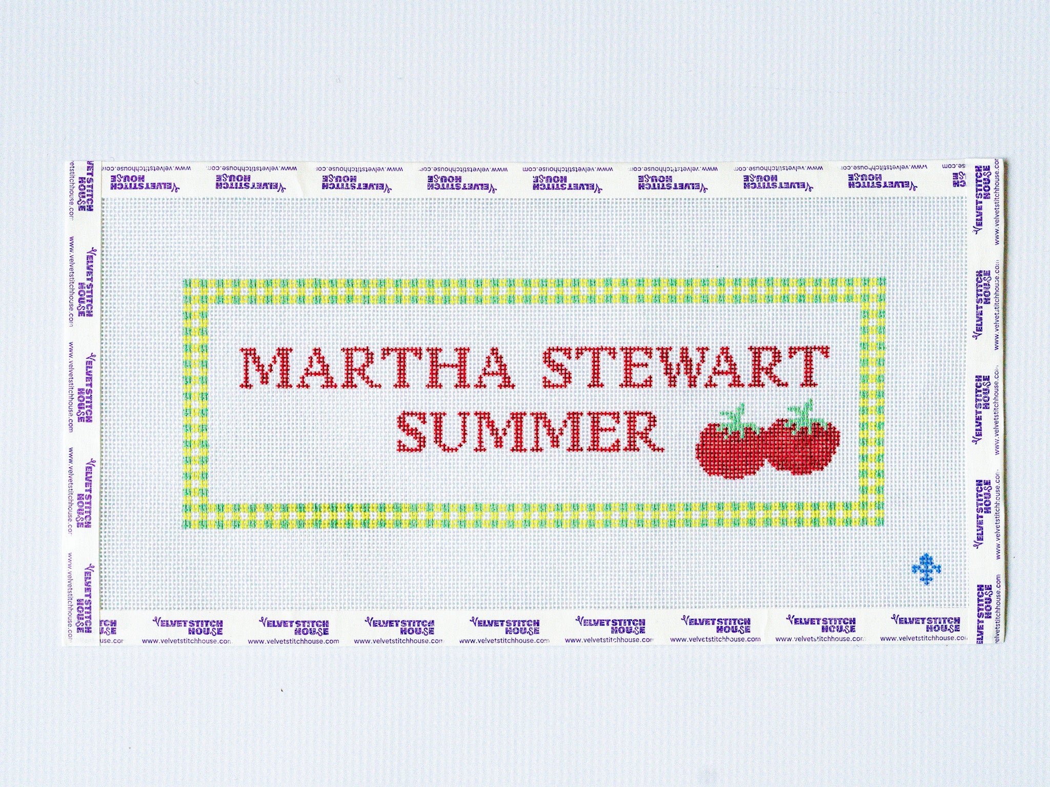 Martha Stewart Summer needlepoint design with red text and green border on a white background and tomato icon