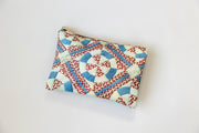 Fabric pouch with geometric pattern on a white background