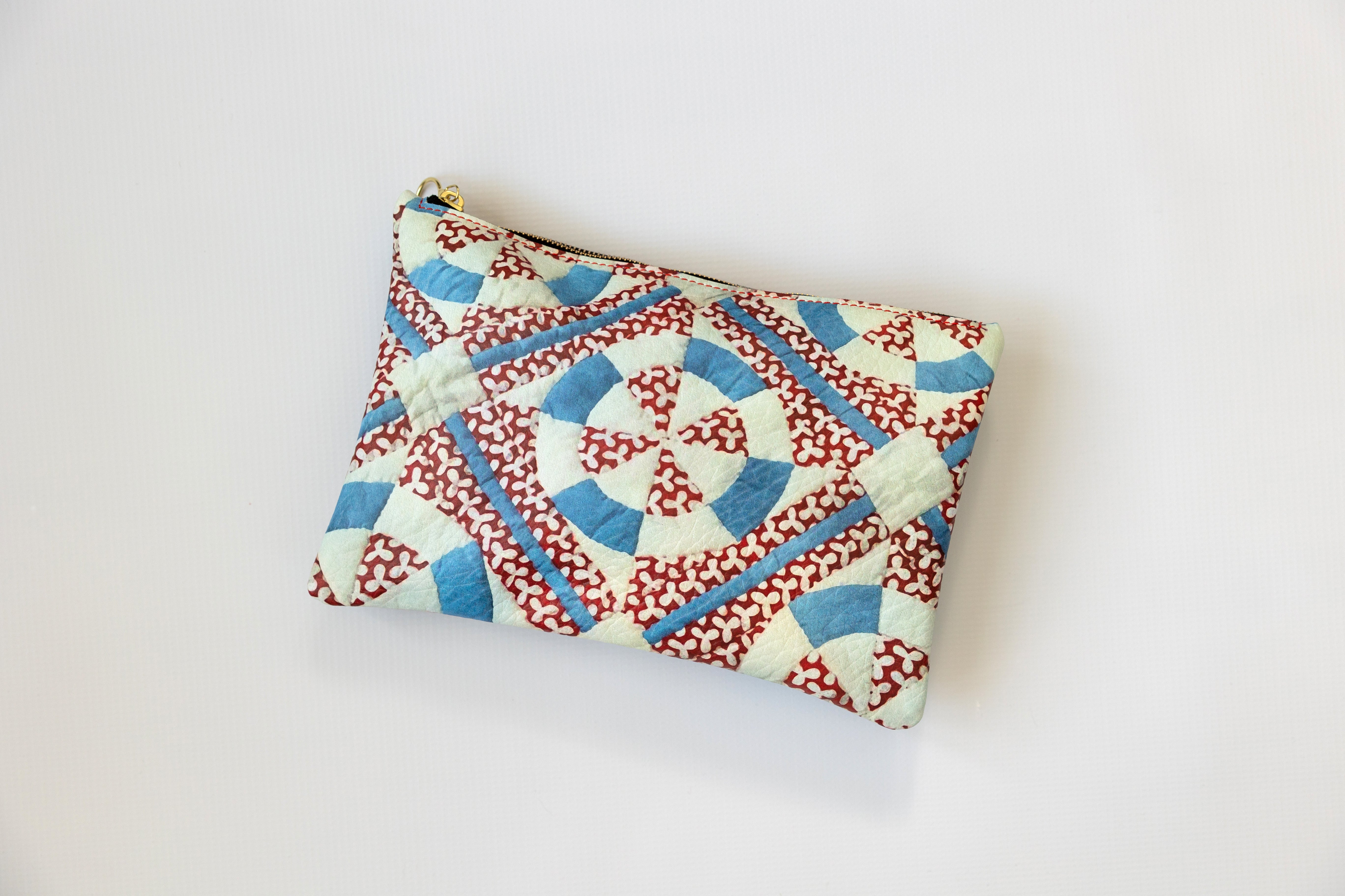 Fabric pouch with geometric pattern on a white background