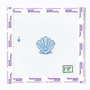 Needlepoint pattern with a blue shell design on a white background