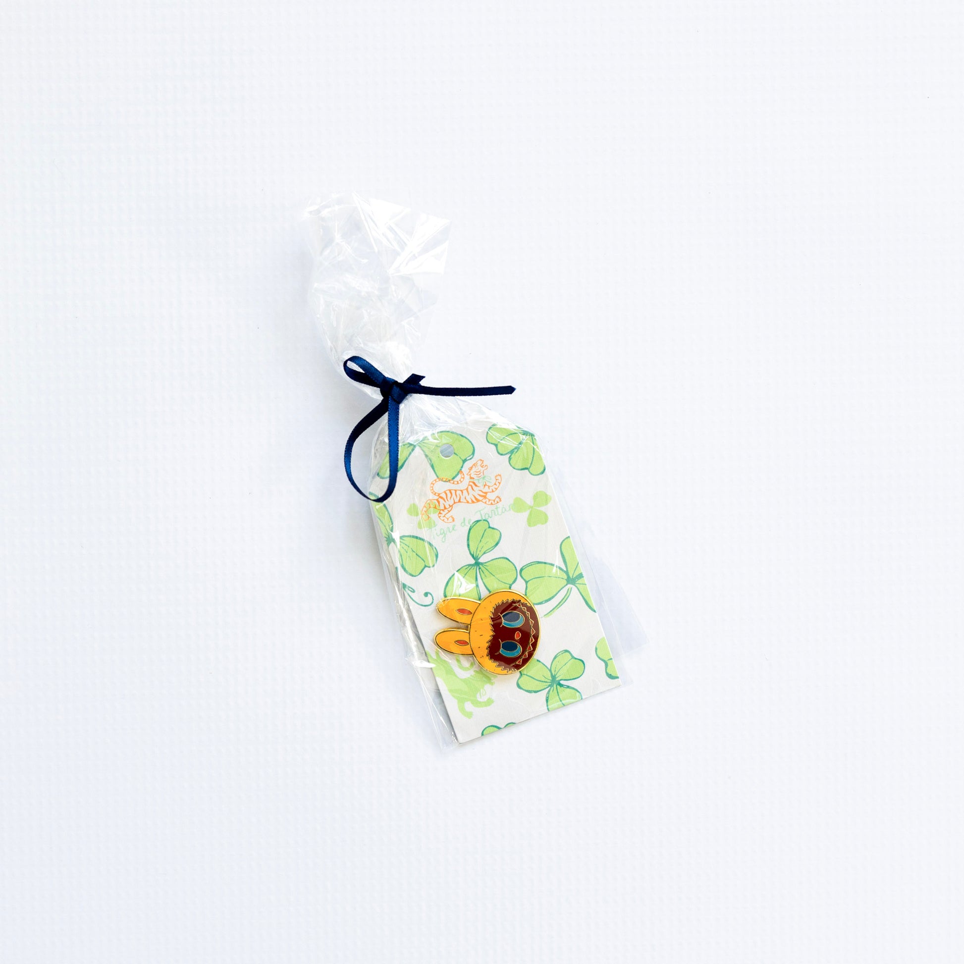 Small pouch with a labubu inspired monster needleminder magnet design on a white background