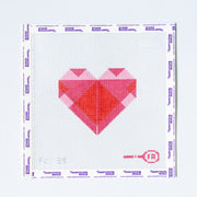 Needlepoint pattern with a geometric heart design on a white background