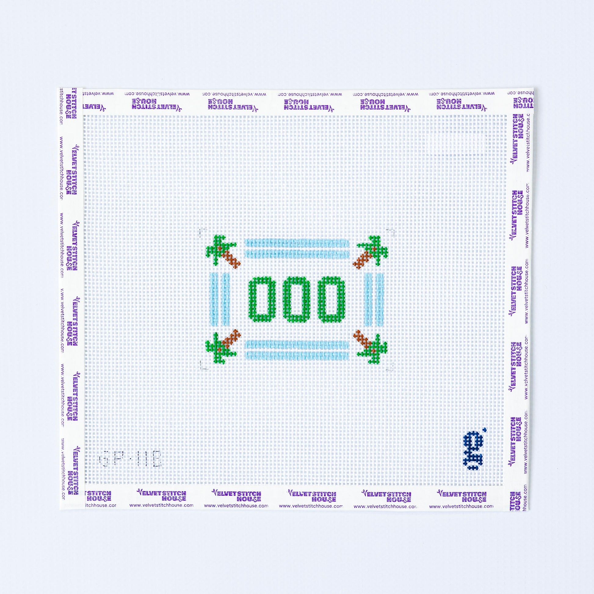 Needlepoint pattern with '000' and decorative elements on a grid background
