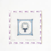 Needlepoint pattern with a flower and bow design on a white background