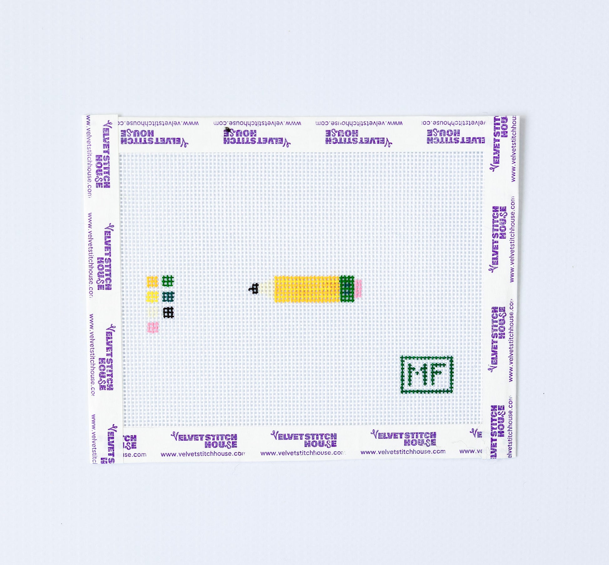 Mini Needlepoint pattern with yellow pencil 