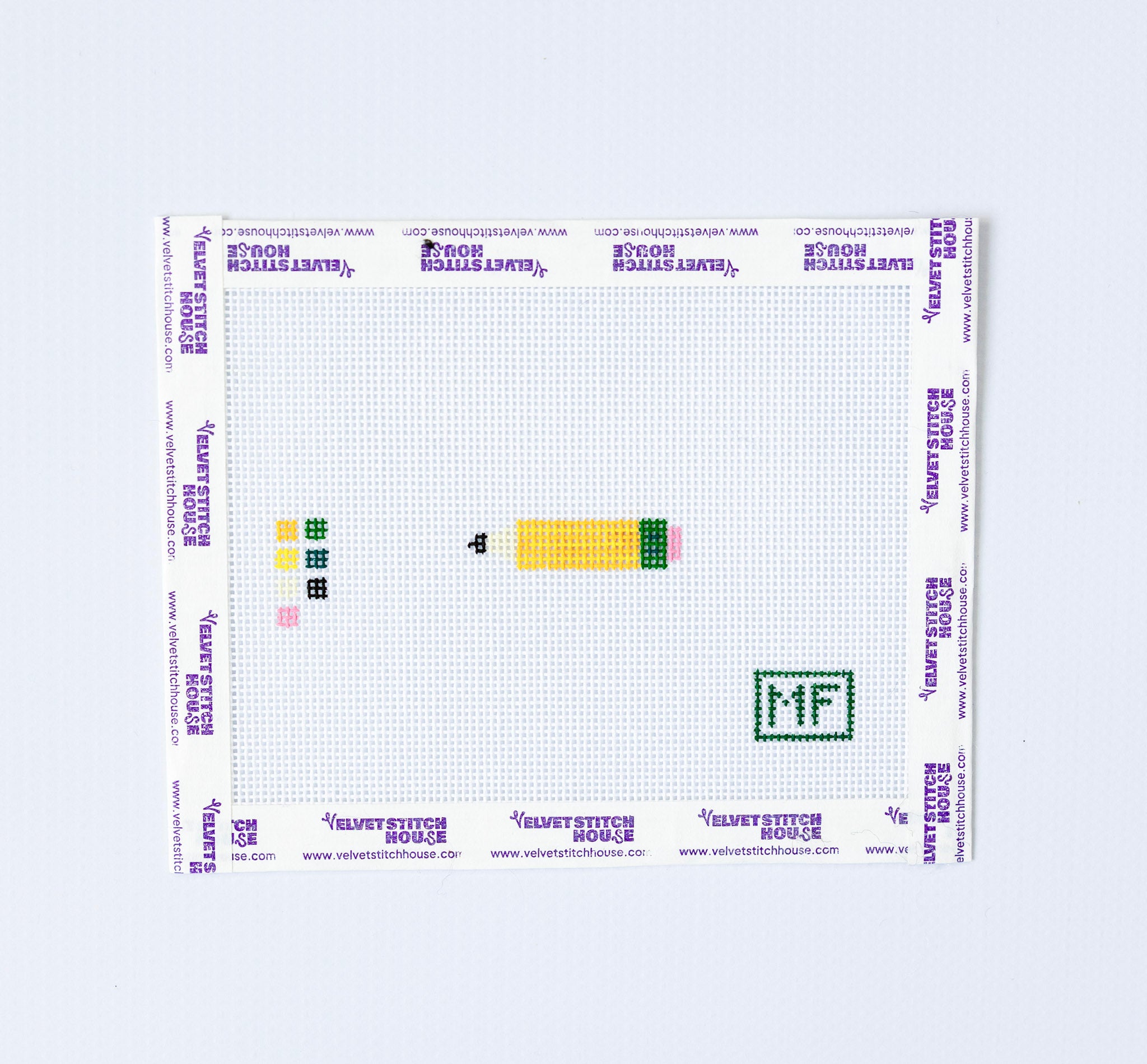 Mini Needlepoint pattern with yellow pencil 