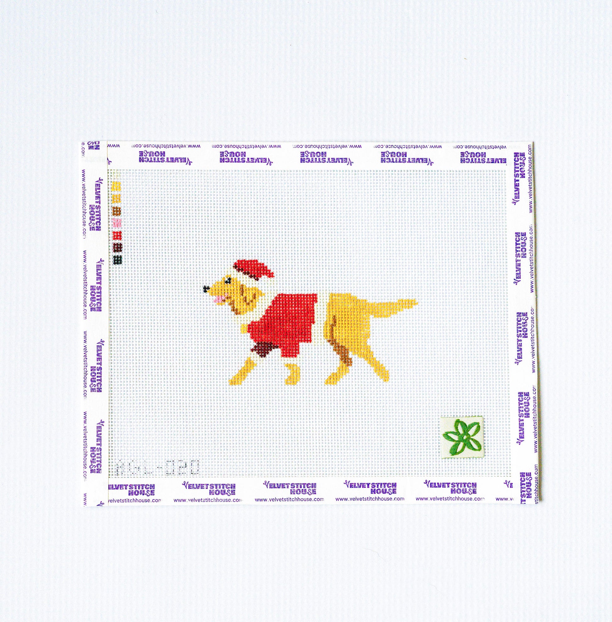 Needlepoint pattern with a dog wearing a red coat and Santa hat on a white background.