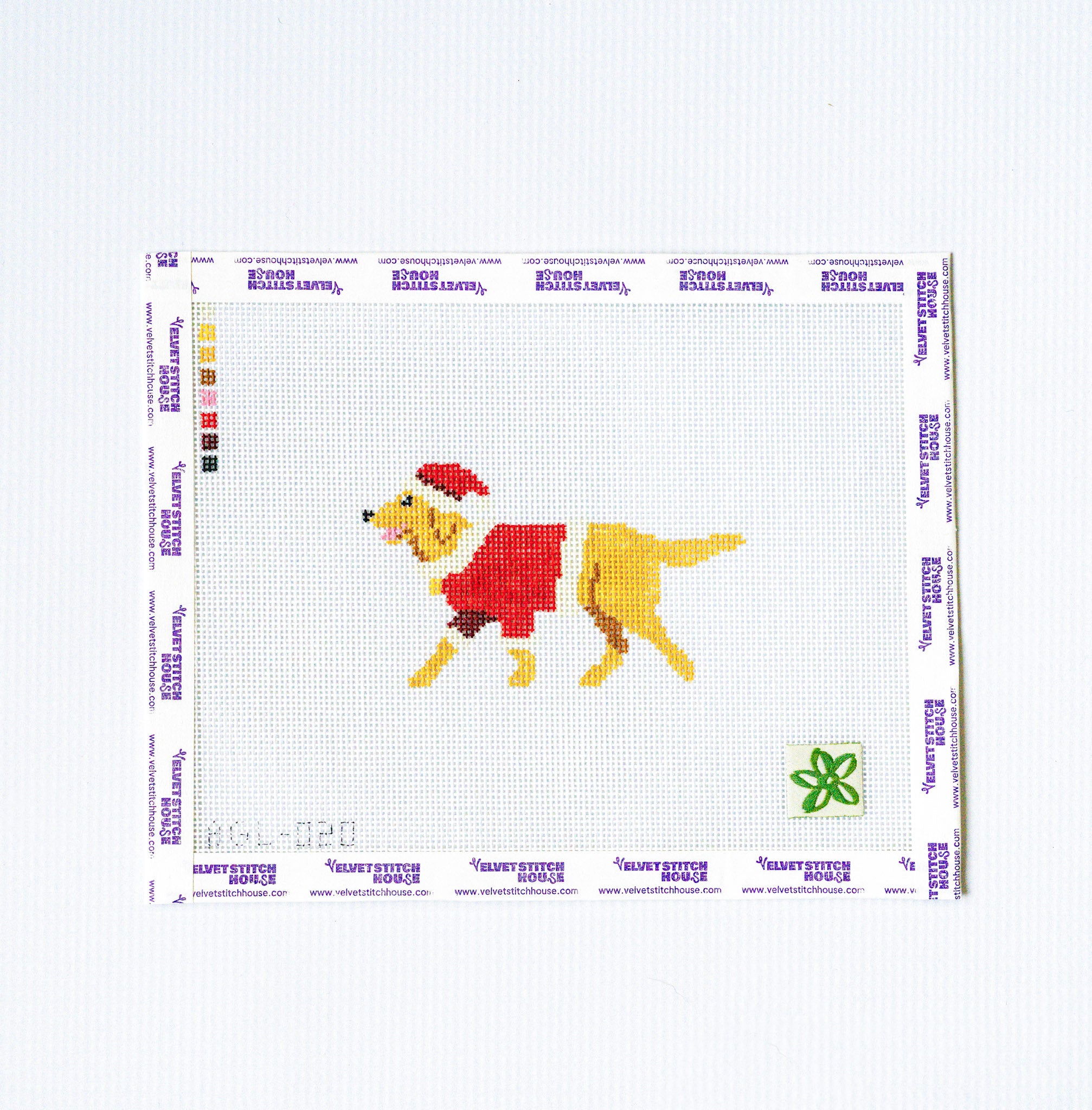 Needlepoint pattern with a dog wearing a red coat and Santa hat on a white background.