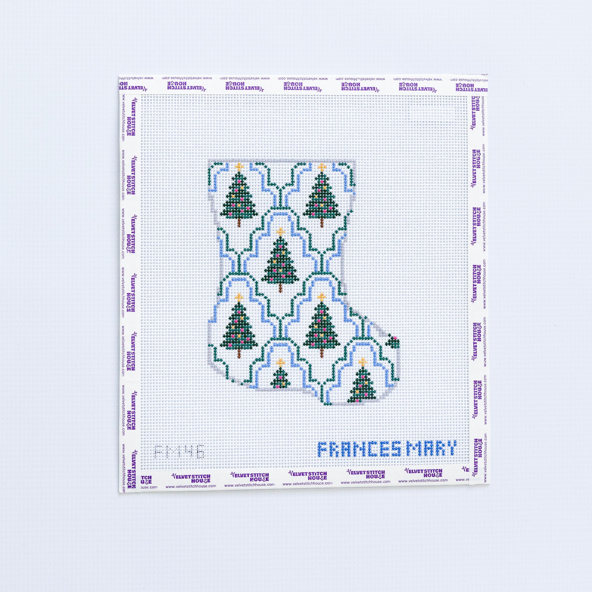 Needlepoint pattern with Christmas trees on a white background, branded 'Frances Mary'.