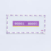 Needlepoint pattern key fob of a purple label displaying '60203' with yellow scallop edge.