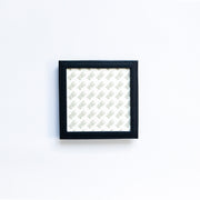 Small navy self finishing frame on a white background