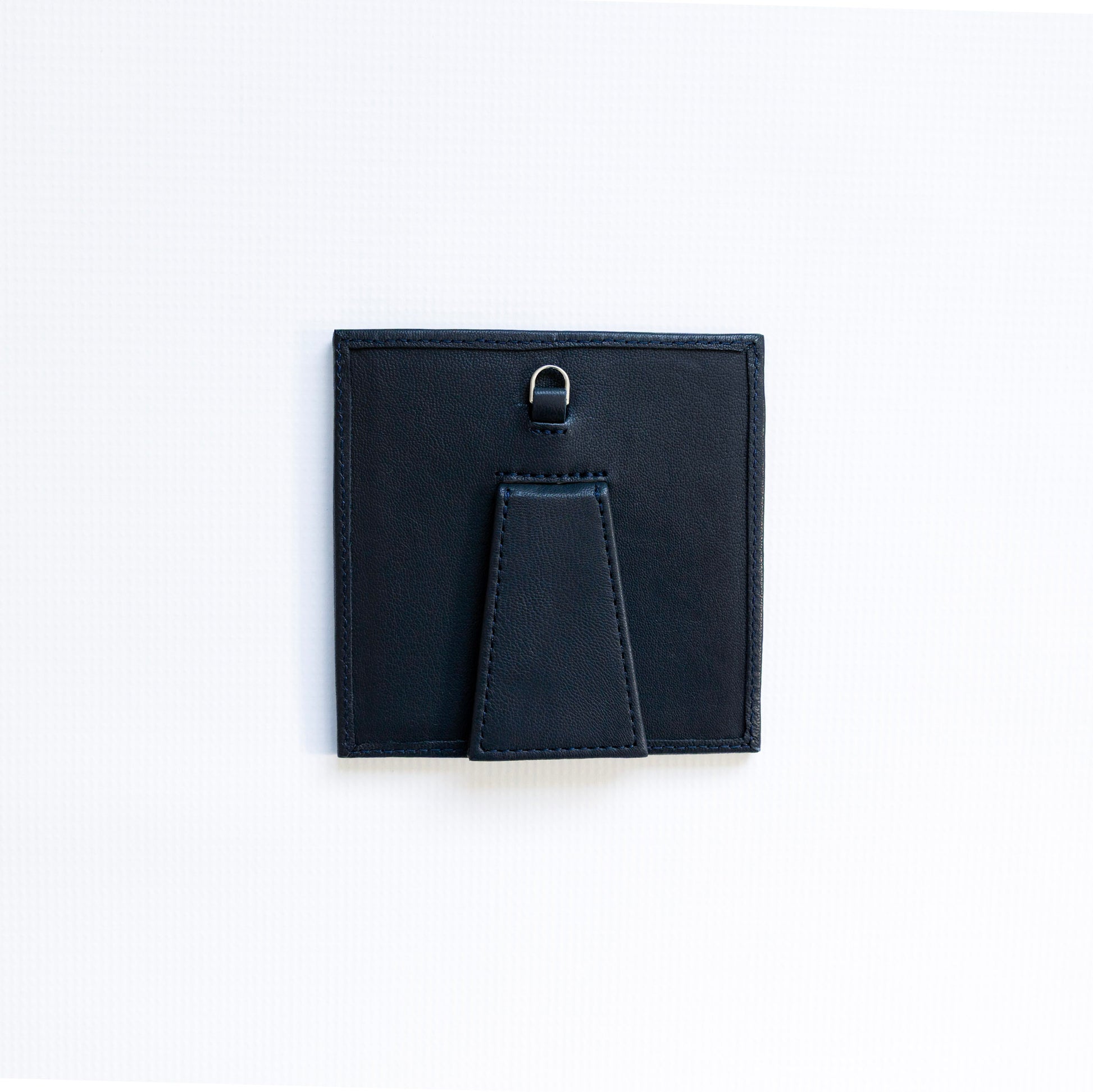 Small navy self finishing frame on a white background